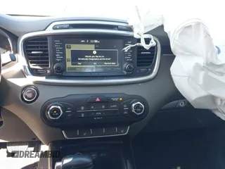 2016 Kia Sorento SX with VIN 5XYPKDA55GG174984, listed as a IAAI auction lot 41216303 with 142,875 mi miles. Bid and sale history available at carsss.com. Image 21.