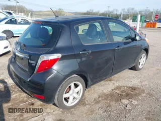 2013 Toyota Yaris L with VIN JTDKTUD35DD548148, listed as a IAAI auction lot 41939847 with 336,231 mi miles. Bid and sale history available at carsss.com. Image 4.