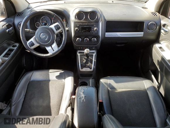 2016 Jeep Compass High Altitude Edition with VIN 1C4NJCEA4GD792582, listed as a Copart auction lot 48812395 with 181,896 mi miles and Salvage Title. Bid and sale history available at carsss.com. Image 8.