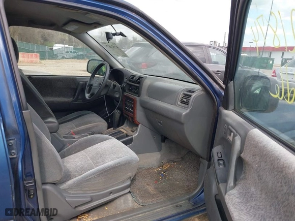 2002 Isuzu Rodeo S with VIN 4S2CK58W124320988, listed as a IAAI auction lot 41921874 with 227,320 mi miles. Bid and sale history available at carsss.com. Image 5.