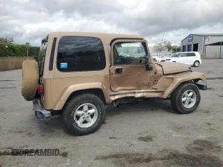 1999 Jeep Wrangler Sahara with VIN 1J4FY49S3XP441051, listed as a Copart auction lot 50946175 with 112,884 mi miles and Salvage Title. Bid and sale history available at carsss.com. Image 3.