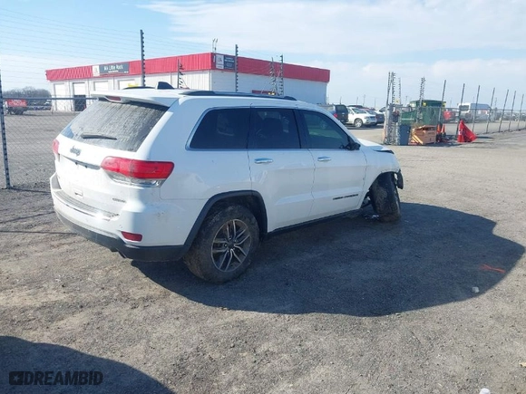2019 Jeep Grand Cherokee Limited with VIN 1C4RJFBG3KC734697, listed as a IAAI auction lot 41645913 with 128,419 mi miles. Bid and sale history available at carsss.com. Image 4.
