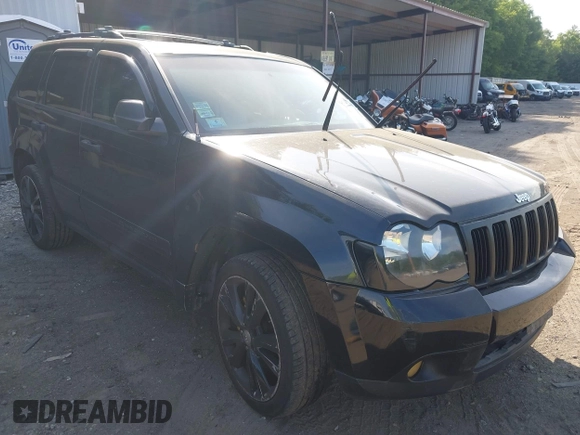 2005 Jeep Grand Cherokee Laredo z VIN 1J4GR48K65C725099, wystawiony jako IAAI lot #42509223 z przebiegiem 249 216 mil mil oraz . Historia ofert i sprzedaży dostępna na DreamBid. Obrazek 1.