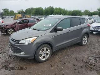 2014 Ford Escape SE z VIN 1FMCU9GX1EUA98962, wystawiony jako Copart lot #58483805 z przebiegiem Nie podano mil oraz Czysty tytuł • Clean title. Historia ofert i sprzedaży dostępna na DreamBid. Obrazek 1.