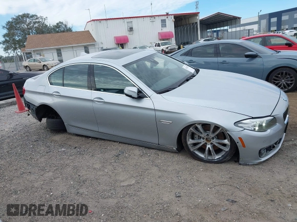 2015 BMW 5 Series 535i xDrive with VIN WBA5B3C54FD544802, listed as a IAAI auction lot 41283822 with 93,828 mi miles. Bid and sale history available at carsss.com. Image 13.