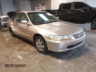 2000 Honda Accord SE z VIN 1HGCG5673YA051154, wystawiony jako IAAI lot #41382000 z przebiegiem 272 554 mil mil oraz . Historia ofert i sprzedaży dostępna na DreamBid. Obrazek 1.