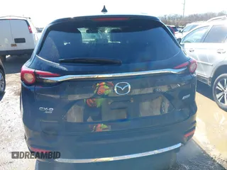 2018 Mazda CX-9 Touring with VIN JM3TCBCY3J0228231, listed as a IAAI auction lot 41596236 with 133,481 mi miles and . Bid and sale history available at DreamBid. Image 17.