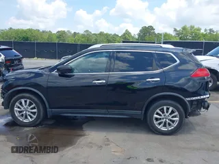 2017 Nissan Rogue S with VIN KNMAT2MT9HP574966, listed as a IAAI auction lot 42128575 with 203,079 mi miles and . Bid and sale history available at carsss.com. Image 15.