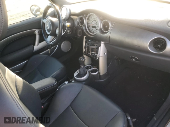 2007 MINI Convertible S with VIN WMWRH33567TL94957, listed as a Copart auction lot 42127775 with 90,401 mi miles and Salvage title. Bid and sale history available at DreamBid. Image 8.