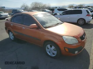 2009 Kia Rio SX with VIN KNADE223496514284, listed as a Copart auction lot 48550105 with 114,411 mi miles and Salvage Title. Bid and sale history available at carsss.com. Image 4.