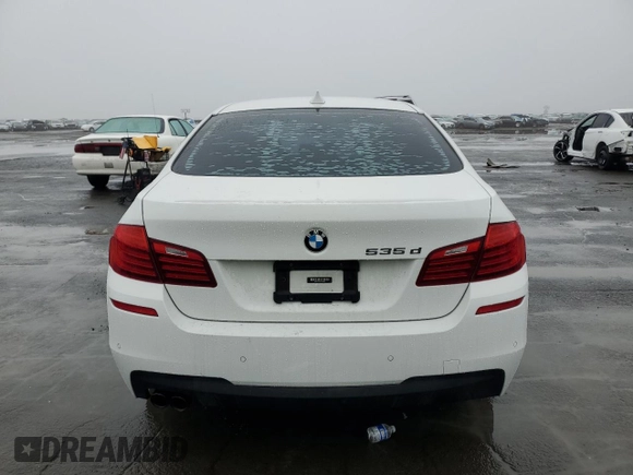 2014 BMW 5 Series 535d with VIN WBAXA5C58ED690187, listed as a Copart auction lot 86191924 with 116,624 mi miles and Salvage Title. Bid and sale history available at carsss.com. Image 6.