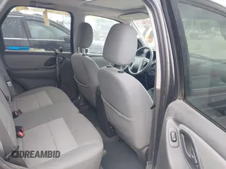 2006 Ford Escape XLT with VIN 1FMYU03156KA84031, listed as a IAAI auction lot 42276336 with 136,038 mi miles and . Bid and sale history available at DreamBid. Image 8.