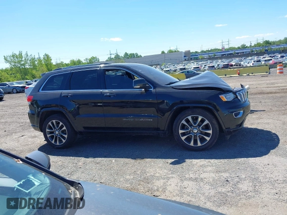 2017 Jeep Grand Cherokee Overland with VIN 1C4RJFCG0HC844713, listed as a IAAI auction lot 42293301 with 83,791 mi miles and . Bid and sale history available at DreamBid. Image 13.