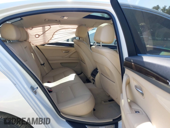 2015 BMW 5 Series 528i xDrive with VIN WBA5A7C52FD622472, listed as a IAAI auction lot 41999000 with 106,602 mi miles and . Bid and sale history available at carsss.com. Image 8.