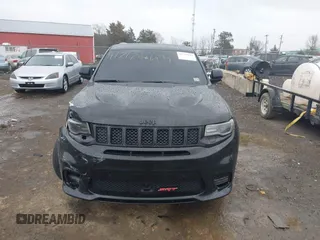 2018 Jeep Grand Cherokee SRT z VIN 1C4RJFDJ2JC391503, wystawiony jako IAAI lot #41717243 z przebiegiem 78 157 mil mil oraz . Historia ofert i sprzedaży dostępna na DreamBid. Obrazek 12.