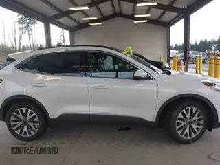 2020 Ford Escape Titanium Hybrid z VIN 1FMCU9DZ8LUA58350, wystawiony jako IAAI lot #41975564 z przebiegiem 38 387 mil mil oraz . Historia ofert i sprzedaży dostępna na DreamBid. Obrazek 13.