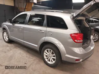 2017 Dodge Journey SXT z VIN 3C4PDCBG8HT589750, wystawiony jako IAAI lot #42286485 z przebiegiem 160 859 mil mil oraz . Historia ofert i sprzedaży dostępna na DreamBid. Obrazek 3.