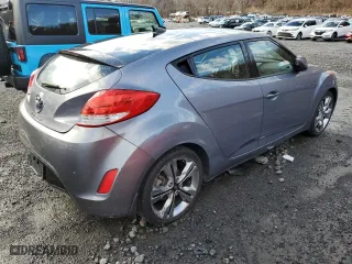 2016 Hyundai Veloster with VIN KMHTC6AD2GU283458, listed as a Copart auction lot 87025344 with 68,752 mi miles and Salvage Title. Bid and sale history available at carsss.com. Image 3.
