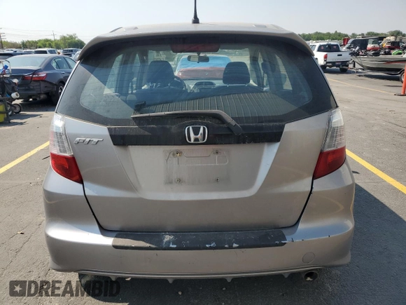 2010 Honda Fit Sport with VIN JHMGE8H60AS025797, listed as a Copart auction lot 65152145 with 240,719 mi miles and Clean title. Bid and sale history available at DreamBid. Image 6.