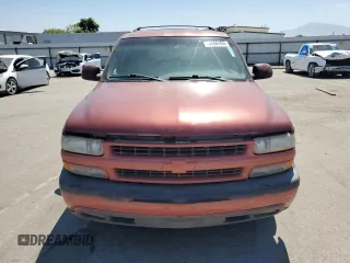 2001 Chevrolet Tahoe LT with VIN 1GNEC13T71R164164, listed as a Copart auction lot 60066165 with 234,506 mi miles and Salvage title. Bid and sale history available at DreamBid. Image 5.