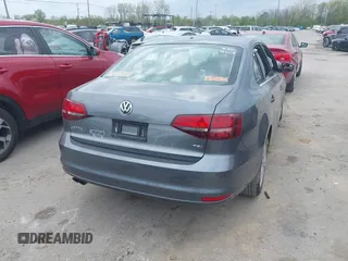 2017 Volkswagen Jetta S with VIN 3VW2B7AJ1HM253059, listed as a IAAI auction lot 42171533 with Not provided miles and . Bid and sale history available at DreamBid. Image 4.
