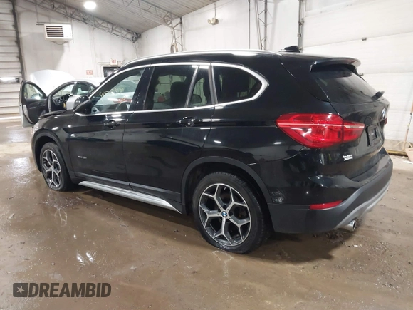 2018 BMW X1 xDrive28i with VIN WBXHT3C30J5K29383, listed as a IAAI auction lot 41503314 with 107,678 mi miles. Bid and sale history available at carsss.com. Image 3.