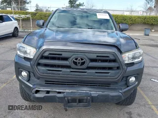 2017 Toyota Tacoma SR5 with VIN 3TMAZ5CN7HM036078, listed as a IAAI auction lot 41698163 with 91,376 mi miles. Bid and sale history available at carsss.com. Image 12.