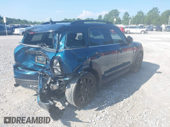 2022 MINI Countryman Cooper S with VIN WMZ53BR02N3N36112, listed as a IAAI auction lot 42561840 with 60,479 mi miles and . Bid and sale history available at DreamBid. Image 4.