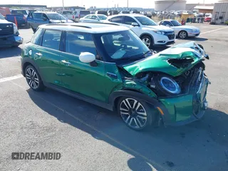 2022 MINI Hardtop 4 Door Cooper S z VIN WMW53DK0XN2R31678, wystawiony jako IAAI lot #41859367 z przebiegiem Nie podano mil oraz . Historia ofert i sprzedaży dostępna na DreamBid. Obrazek 1.