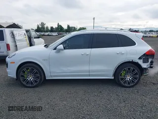 2016 Porsche Cayenne S E-Hybrid z VIN WP1AE2A22GLA17486, wystawiony jako IAAI lot #42229641 z przebiegiem 91 642 mil mil oraz . Historia ofert i sprzedaży dostępna na DreamBid. Obrazek 15.