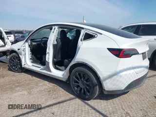 2022 Tesla Model Y Long Range with VIN 7SAYGDEE4NF428434, listed as a IAAI auction lot 41578503 with 35,460 mi miles and . Bid and sale history available at DreamBid. Image 3.