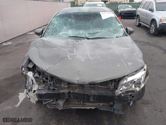 2014 Toyota Camry Hybrid LE with VIN 4T1BD1FK2EU134838, listed as a IAAI auction lot 41912000 with 132,000 mi miles. Bid and sale history available at carsss.com. Image 12.