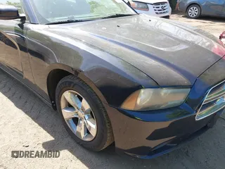 2012 Dodge Charger SE with VIN 2C3CDXBGXCH298176, listed as a IAAI auction lot 42138725 with 128,717 mi miles. Bid and sale history available at carsss.com. Image 6.