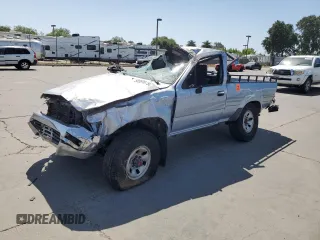 1991 Toyota Pickup DX z VIN JT4RN01P7M0018845, wystawiony jako Copart lot #58569615 z przebiegiem 275 355 mil mil oraz Szkoda całkowita • Salvage title. Historia ofert i sprzedaży dostępna na DreamBid. Obrazek 1.