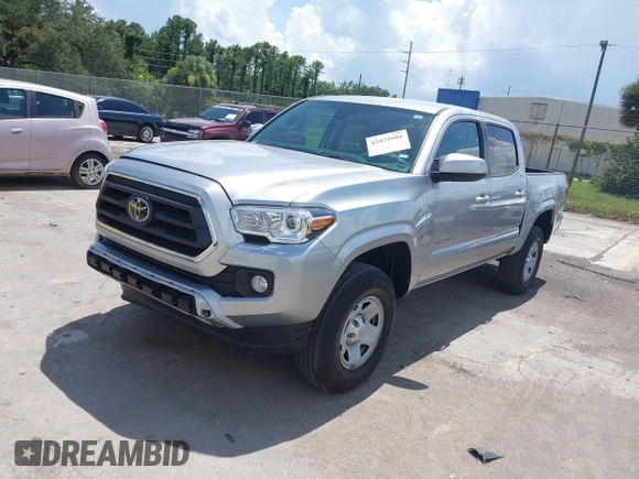 2023 Toyota Tacoma SR with VIN 3TYAX5GN0PT090132, listed as a IAAI auction lot 42472501 with 28,979 mi miles and . Bid and sale history available at DreamBid. Image 2.