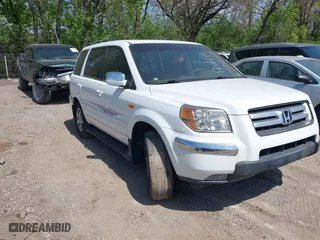 2007 Honda Pilot EX-L with VIN 5FNYF18567B032406, listed as a IAAI auction lot 42120219 with 205,687 mi miles. Bid and sale history available at carsss.com. Image 1.