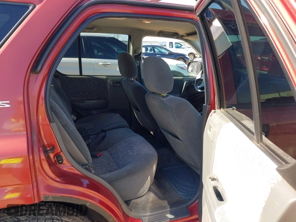 2001 Isuzu Rodeo S with VIN 4S2CK58W814326849, listed as a IAAI auction lot 41769624 with 366,460 mi miles and . Bid and sale history available at DreamBid. Image 8.