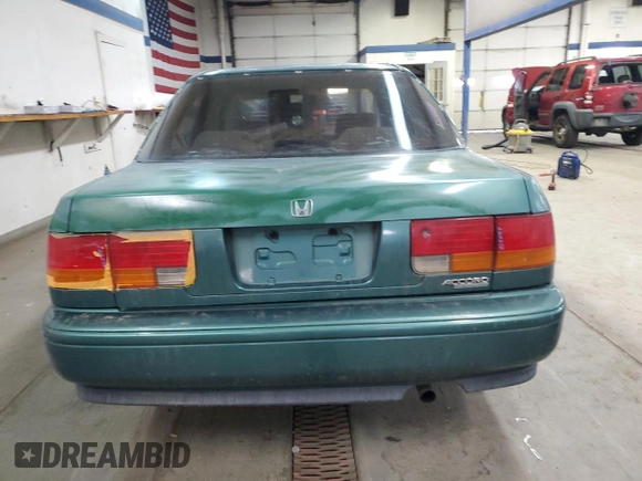 1993 Honda Accord z VIN 1HGCB7652PA155769, wystawiony jako Copart lot #45200625 z przebiegiem 251 834 mil mil oraz Szkoda całkowita • Salvage title. Historia ofert i sprzedaży dostępna na DreamBid. Obrazek 6.