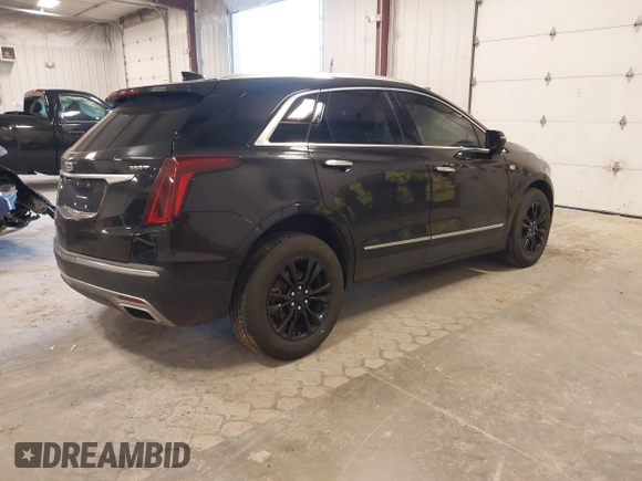 2021 Cadillac XT5 AWD Premium Luxury with VIN 1GYKNDR41MZ129884, listed as a IAAI auction lot 41835444 with 61,878 mi miles and . Bid and sale history available at DreamBid. Image 4.