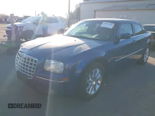 2009 Chrysler 300 Touring with VIN 2C3LA53V89H565270, listed as a IAAI auction lot 41069505 with 112,830 mi miles. Bid and sale history available at carsss.com. Image 2.