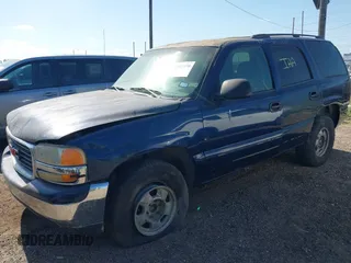 2003 GMC Yukon SLT with VIN 1GKEC13V13R212713, listed as a IAAI auction lot 42015270 with 1 mi miles. Bid and sale history available at carsss.com. Image 2.