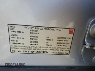 2016 Tesla Model S 90D with VIN 5YJSA1E26GF147974, listed as a Copart auction lot 82815404 with 126,609 mi miles and Salvage Title. Bid and sale history available at DreamBid. Image 14.