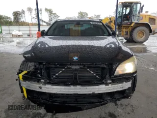 2011 BMW 7 Series 750i xDrive with VIN WBAKC6C56BC394810, listed as a Copart auction lot 79025014 with 152,399 mi miles and Salvage title. Bid and sale history available at DreamBid. Image 5.
