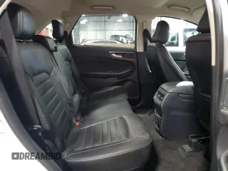 2020 Ford Edge SEL z VIN 2FMPK4J96LBA41535, wystawiony jako Copart lot #56077665 z przebiegiem 55 666 mil mil oraz Szkoda całkowita • Salvage title. Historia ofert i sprzedaży dostępna na DreamBid. Obrazek 11.