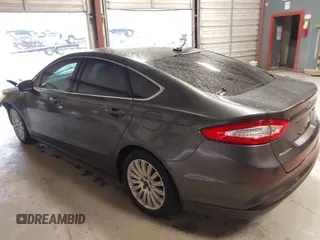 2016 Ford Fusion SE Hybrid with VIN 3FA6P0LU2GR388787, listed as a IAAI auction lot 41733661 with 86,078 mi miles and . Bid and sale history available at DreamBid. Image 3.