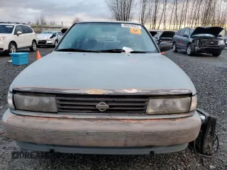 1992 Nissan Sentra E с VIN 1N4EB32A7NC702402, выставлен на аукционе Copart как лот 86629524 с пробегом 233 476 миль миль и Списание • Salvage title. История ставок и продаж доступна на DreamBid. Изображение 5.