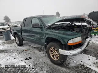 2002 Dodge Dakota SLT с VIN 1B7HG48N12S614309, выставлен на аукционе Copart как лот 87309554 с пробегом 287 994 миль миль и Списание • Salvage title. История ставок и продаж доступна на DreamBid. Изображение 4.