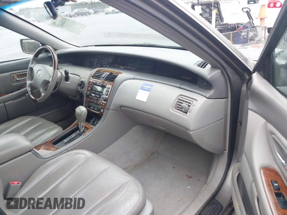2003 Toyota Avalon XL with VIN 4T1BF28B93U337672, listed as a IAAI auction lot 41626441 with 240,787 mi miles and . Bid and sale history available at carsss.com. Image 5.