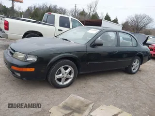 1998 Nissan Maxima GXE with VIN JN1CA21D4WT605270, listed as a IAAI auction lot 41505206 with 114,425 mi miles and . Bid and sale history available at DreamBid. Image 14.