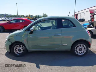 2013 FIAT 500 Lounge with VIN 3C3CFFCR5DT739516, listed as a IAAI auction lot 42439476 with 62,919 mi miles and . Bid and sale history available at DreamBid. Image 14.